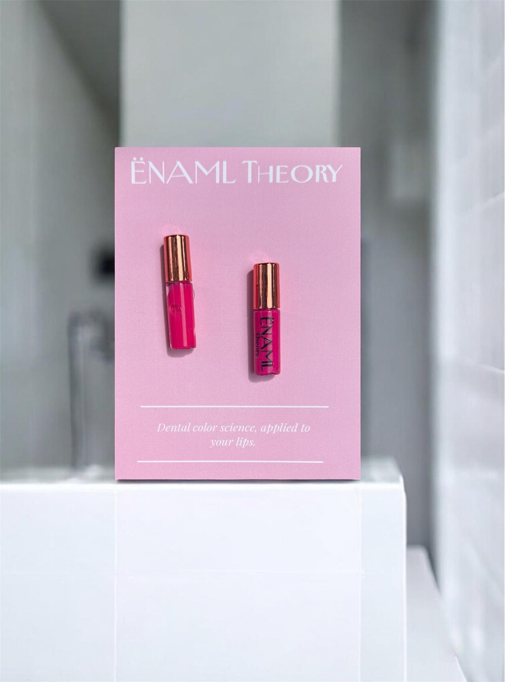 ËNAML Theory dual sample kit featuring Founding Pink and The Barbie Edit lip pigments on a pink display card.
